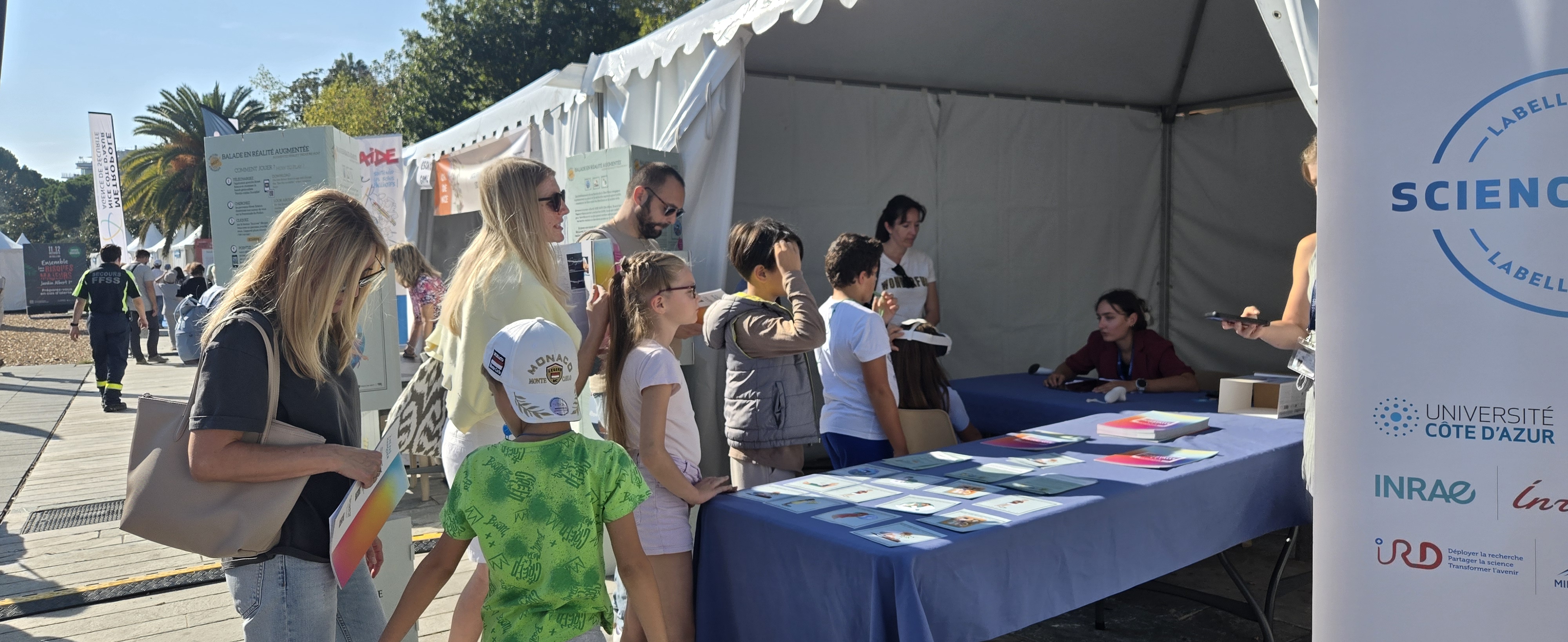 Université Côte d'Azur booth with Alternate Events